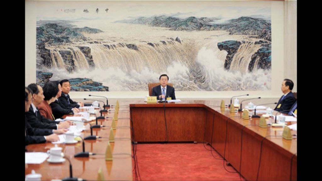 張德江聽取喬曉陽報告審議結果