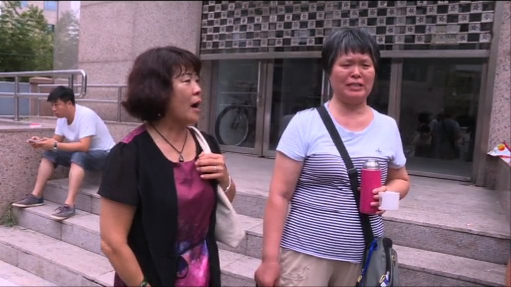 失蹤馬航客機乘客家屬不滿中止搜救