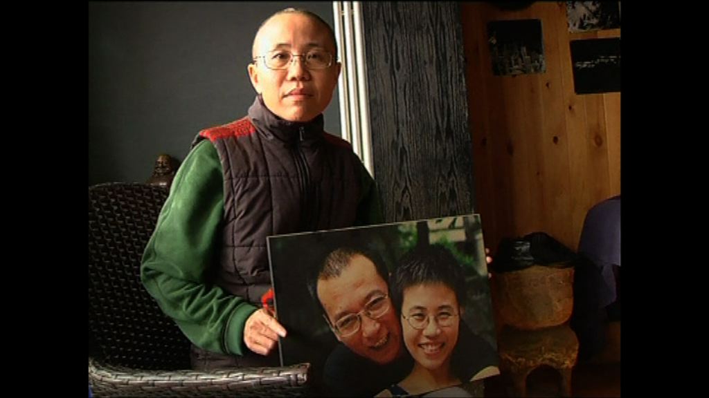 劉曉波好友指當局要求家屬答應火化並海葬