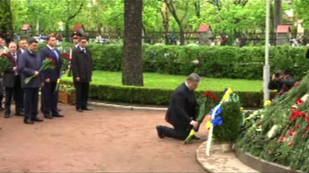 波羅申科表揚清理核災人員